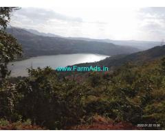 Low cost 780 Acre Dam touch Land For Sale In Chiplun