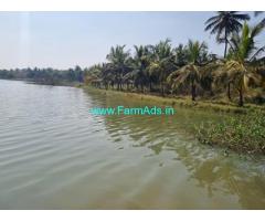 Lake attached 1 acre Agriculture land for Sale 102 kms from Bangalore