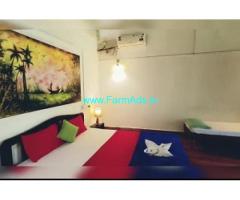 Guest house property 20 rooms with stream for sale in Coorg