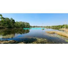 Lake attached 2 Acre Farm Land sale Near Kanthraj Circle, Mulabagal Road