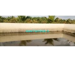 21 Acres yielding coconut garden for sale near Hiriyur